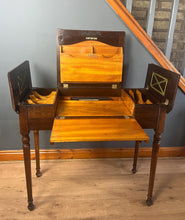 Load image into Gallery viewer, This piece&#39;s tidy and neat finish, with its groundbreaking design, incorporates a lifting centre section with a writing surface and letter racking. The side sections have hinged lids that open to further storage compartments. The table is supported on elegant turned legs. This is a great space-saving piece that will suit a traditional home. It is the perfect size for your laptop and a great addition to the space-saving design.
