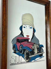 Load image into Gallery viewer, This mirror features an Art Deco-style illustration of a woman wearing a cloche hat alongside a vintage Stutz automobile, with the STUTZ logo clearly visible at the bottom.
