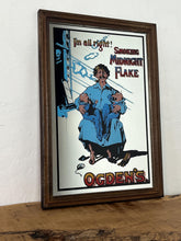 Load image into Gallery viewer, This mid-20th-century advertising piece features an illustration of a man smoking a pipe while holding two babies, conveying a sense of contentment associated with the tobacco.

