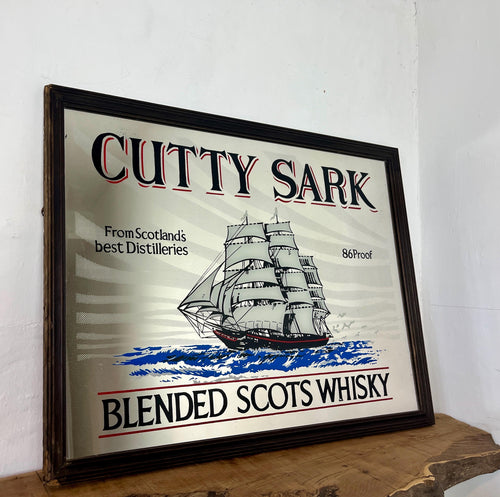 The mirror features the iconic image of the Cutty Sark clipper ship, a renowned tea clipper launched in 1869, which inspired the whisky's name. It also states "From Scotland's best Distilleries" and "86 Proof" (which translates to 43% ABV).