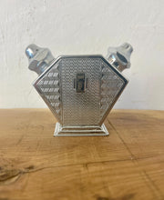 Load image into Gallery viewer, Stunning period piece, featuring a cute Art Deco combined salt and pepper shaker or cruet set, dating to the 1920s or 1930s due to its geometric design and use of chrome-plated metal.

