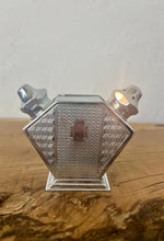 Load image into Gallery viewer, Stunning period piece, featuring a cute Art Deco combined salt and pepper shaker or cruet set, dating to the 1920s or 1930s due to its geometric design and use of chrome-plated metal.
