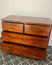 Load image into Gallery viewer, An immaculate quality Arts &amp; Crafts chest of drawers made in figured English mahogany. Having an arrangement of 2 over 2 drawers, all retaining the original decorative handles and escutcheons. With mahogany sides on a plinth. Beautiful original condition throughout. English, Circa 1900.
