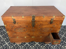Load image into Gallery viewer, A beautiful Anglo-Indian Marriage Dowry chest circa 1900 with campaign handles and original wooden wheels, a very well-crafted and decorative chest, decorated with brass inlaid wire work, classically indicative of Indian artistry. This piece is a fine example of an Anglo-Indian chest. Designed as a dowry piece to be given by the father of the bride in an Indian wedding, you would have gold, jewellery, land deeds, money and fine linens stored inside.
