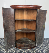 Load image into Gallery viewer, All original brass hinges and escutcheons, fancy rococo brass escutcheons and brass H-hinges and beautifully figured oak doors with mahogany banding to the edges and beautiful shell inlay design with multiple tones of veneer above a shaped pelmet.
