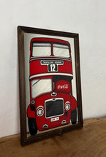 Load image into Gallery viewer, The mirror prominently features a red London double-decker bus with TRAFALGAR SQUARE and 12 on its destination sign, and Coca-Cola branding on the side of the bus. The license plate reads LON 80.
