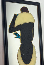 Load image into Gallery viewer, The artwork is further enhanced by the addition of raised, textured elements, outlines of the figure and details of the dress and fur collar. This creates a tactile, three-dimensional quality to the piece, contrasting with the smooth mirrored surface.
