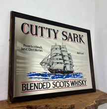 Load image into Gallery viewer, The mirror features the iconic image of the Cutty Sark clipper ship, a renowned tea clipper launched in 1869, which inspired the whisky&#39;s name. It also states &quot;From Scotland&#39;s best Distilleries&quot; and &quot;86 Proof&quot; (which translates to 43% ABV).
