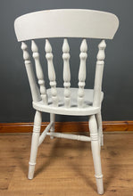 Load image into Gallery viewer, This sturdy spindle back chair is a classic style of wooden chair featuring a seat, a backrest, and a series of turned spindles that connect them.
