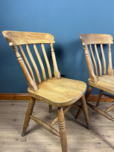 Load image into Gallery viewer, A classic design, featuring a lath back and a pleasingly shaped seat, combined with excellent build craftsmanship. The seat stands on turned legs with a single H-stretcher, making the chairs sturdy.
