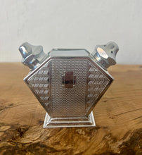 Load image into Gallery viewer, Stunning period piece, featuring a cute Art Deco combined salt and pepper shaker or cruet set, dating to the 1920s or 1930s due to its geometric design and use of chrome-plated metal.

