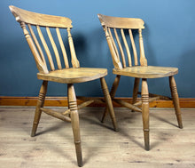 Load image into Gallery viewer, A classic design, featuring a lath back and a pleasingly shaped seat, combined with excellent build craftsmanship. The seat stands on turned legs with a single H-stretcher, making the chairs sturdy.
