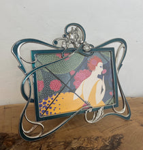 Load image into Gallery viewer, Beautiful vintage picture frame designed in the Art Deco style, featuring ornate, flowing lines and a green enamel finish. It is made from metal, likely pewter or a silver-plated alloy.
