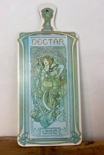 Beautiful vintage decorative cutting board featuring Alphonse Mucha's Art Nouveau design for Nectar, Liqueur Superfine.