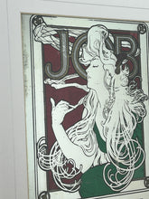 Load image into Gallery viewer, The woman’s hair, wild and swirling through a play of ornate interweaving lines, is a typical Mucha style feature. When this was created, women generally did not smoke in public and usually wore their hair up, making this a daring and wild piece. The geometric shape repeated in the background is the company’s logo.

