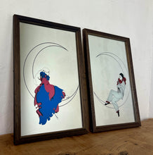 Load image into Gallery viewer, This pair of stunning Art Deco mirrors depicting a Pierrot or Harlequin on a crescent moon is an illustration, first and foremost, of a woman in an Art Deco style, vintage from the mid-20th century.
