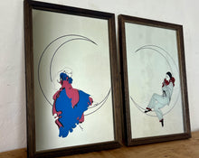 Load image into Gallery viewer, This pair of stunning Art Deco mirrors depicting a Pierrot or Harlequin on a crescent moon is an illustration, first and foremost, of a woman in an Art Deco style, vintage from the mid-20th century.
