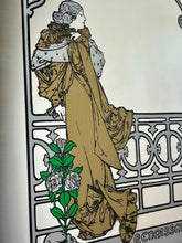 Load image into Gallery viewer, Wonderful Mucha art nouveau mirror featuring a glamorous theatre advertising piece in vivid matte colours, an elegant lady, and a fabulous backdrop.
