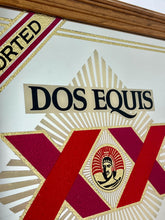 Load image into Gallery viewer, The design features the brand name, the "XX" symbol, the word "BEER", and the face of an Aztec ruler in the centre.
