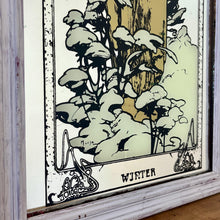 Load image into Gallery viewer, The design is stunning, featuring a glamorous lady wearing a long white shawl against a winter backdrop of trees and plants with a snowy finish. The border is equally impressive with stars and gold infill, hints of gold, and a winter mark in a lovely font.
