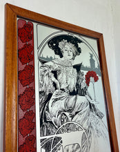Load image into Gallery viewer, A central female figure with flowing hair, a common motif in Mucha's works. Rich, decorative elements including flowers and an ornate background, emphasizing nature's forms.

