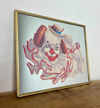 Load image into Gallery viewer, Vintage Elmo the Clown mirror created by the American artist Arthur Sarnoff. This  image shows a cheerful whiteface clown with red hair, a large ruffled collar, and a small straw hat tipped playfully to the side.
