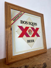 Load image into Gallery viewer, The design features the brand name, the "XX" symbol, the word "BEER", and the face of an Aztec ruler in the centre.
