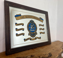 Load image into Gallery viewer, The regiment's badge, displayed prominently on the mirror, features a dragon upon a mount within the Garter, surmounted by the Plume of the Prince of Wales. Its motto was "Unconquered I Serve".
