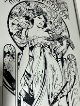 Load image into Gallery viewer, Gorgeous, vibrant Art Nouveau mirror featuring stunning, intricate designs of a beautiful lady against a floral background, with a stand-on designer branding with the famous champagne maker.
