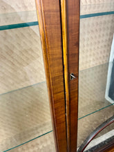 Load image into Gallery viewer, This stunning piece is an antique Art Deco display cabinet, dating from the 1930s. It is characterised by its walnut or mahogany construction, featuring astragal-glazed doors with a distinctive curved pattern and claw-and-ball feet.

