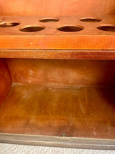 Load image into Gallery viewer, This stunning piece of furniture is an antique Art Deco cocktail cabinet, dating from the 1930’s. It is crafted from figured walnut veneer, a hallmark of the period, known for its distinctive, decorative grain patterns.
