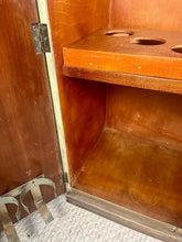 Load image into Gallery viewer, This stunning piece of furniture is an antique Art Deco cocktail cabinet, dating from the 1930’s. It is crafted from figured walnut veneer, a hallmark of the period, known for its distinctive, decorative grain patterns.
