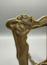 Load image into Gallery viewer, This ornate picture frame is a classic example of Art Nouveau design, likely dating from the early 20th century (c. 1900) or a later mid-century revival. It features characteristic organic, flowing lines and a stylized female figure integrated into the side of the frame.
