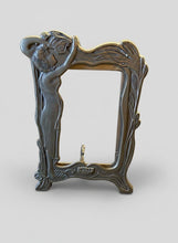 Load image into Gallery viewer, This ornate picture frame is a classic example of Art Nouveau design, likely dating from the early 20th century (c. 1900) or a later mid-century revival. It features characteristic organic, flowing lines and a stylized female figure integrated into the side of the frame.
