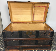 Load image into Gallery viewer, This beautiful piece is an antique dome-top (or barrel-top) steamer trunk, commonly manufactured during the late 19th century (circa 1870–1900).

