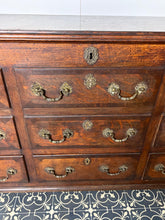 Load image into Gallery viewer, North Country regional antique: The "Mule Chest" Configuration: The upper rows feature faux (dummy) drawer fronts. The top planked lid lifts open like a traditional coffer or blanket box, while only the lower drawers are fully functional.
