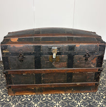 Load image into Gallery viewer, This beautiful piece is an antique dome-top (or barrel-top) steamer trunk, commonly manufactured during the late 19th century (circa 1870–1900).
