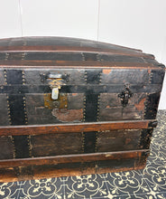 Load image into Gallery viewer, This beautiful piece is an antique dome-top (or barrel-top) steamer trunk, commonly manufactured during the late 19th century (circa 1870–1900).
