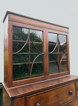 Load image into Gallery viewer, Beautiful Georgian mahogany inlaid secrétaire bookcase, a classic 18th century British furniture design. It combines a display cabinet, a pull-out hidden desk space, and a functional chest of drawers into a single multi-tier case piece.
