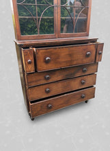 Load image into Gallery viewer, Beautiful Georgian mahogany inlaid secrétaire bookcase, a classic 18th century British furniture design. It combines a display cabinet, a pull-out hidden desk space, and a functional chest of drawers into a single multi-tier case piece.
