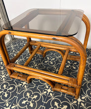 Load image into Gallery viewer, Stylish Italian pair of vintage mid-century modern bohemian bamboo-and-rattan side tables with dark, smoked glass tops.
