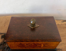 Load image into Gallery viewer, Removable Lid with Solid Brass Hardware, the box is fitted with a fully removable, beautifully polished dark wood lid. A distinctive, diamond-shaped brass finial serves as the handle, adding an elegant metallic contrast to the rich wood tones and highlighting the geometric principles central to Art Deco design.
