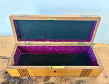 Load image into Gallery viewer, Crafted from stunning, warmly toned figured walnut, this rectangular casket features striking Tunbridge Ware-style geometric mosaic bands inlaid vertically across the domed lid and down the front. The rich, authentic grain contrasts beautifully with the dark, intricate parquetry borders, highlighting the era's skilled handcraftsmanship.
