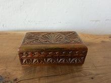 Load image into Gallery viewer, This exquisite Victorian-era antique wooden trinket box showcases a beautiful blend of Art Nouveau organic forms and traditional chip-carving. Originally designed to hold delicate items like postage stamps, jewelry, or small keepsakes, it features a masterfully carved fan and foliage motif on the lid. It serves as a striking decorative statement piece for collectors of historic tobaccoware, stamp boxes, or fine folk art.
