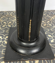 Load image into Gallery viewer, The piece has a beautiful chunky fluted column with a desirable and fashionable ebony tone set with ormolu mounts in a droplet design with floral embellishment in differing lengths on the column a stunning design set on a square base with hidden feet
