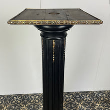 Load image into Gallery viewer, The piece has a beautiful chunky fluted column with a desirable and fashionable ebony tone set with ormolu mounts in a droplet design with floral embellishment in differing lengths on the column a stunning design set on a square base with hidden feet
