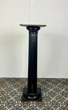 Load image into Gallery viewer, The piece has a beautiful chunky fluted column with a desirable and fashionable ebony tone set with ormolu mounts in a droplet design with floral embellishment in differing lengths on the column a stunning design set on a square base with hidden feet
