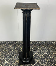 Load image into Gallery viewer, The piece has a beautiful chunky fluted column with a desirable and fashionable ebony tone set with ormolu mounts in a droplet design with floral embellishment in differing lengths on the column a stunning design set on a square base with hidden feet
