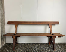 Load image into Gallery viewer, A beautiful Victorian period, pitch pine long, wide and comfortable railway bench, dating from the 2nd half of the 19th century with stunning patina. The bench features an ingenious swing-back design, so it can be sat on from both sides.
