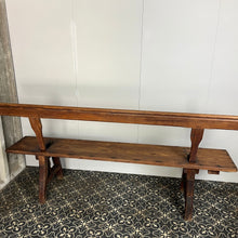 Load image into Gallery viewer, A beautiful Victorian period, pitch pine long, wide and comfortable railway bench, dating from the 2nd half of the 19th century with stunning patina. The bench features an ingenious swing-back design, so it can be sat on from both sides.
